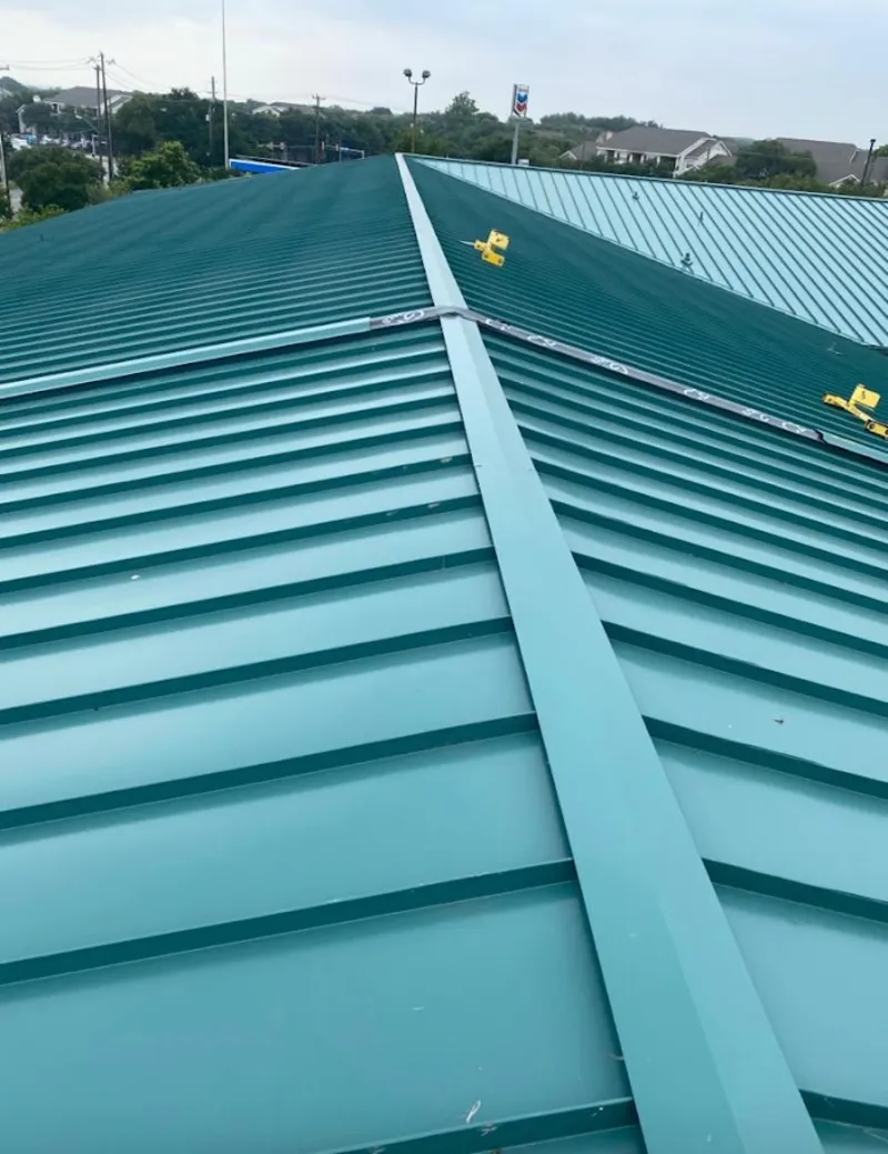 Green commercial metal roof ridge and valley for Metal Roof Repair in Westbrook